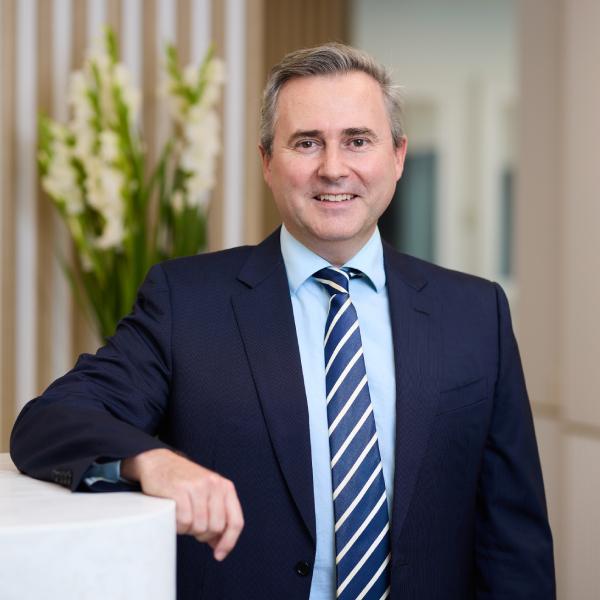 A professional headshot of Dr. David Gunn